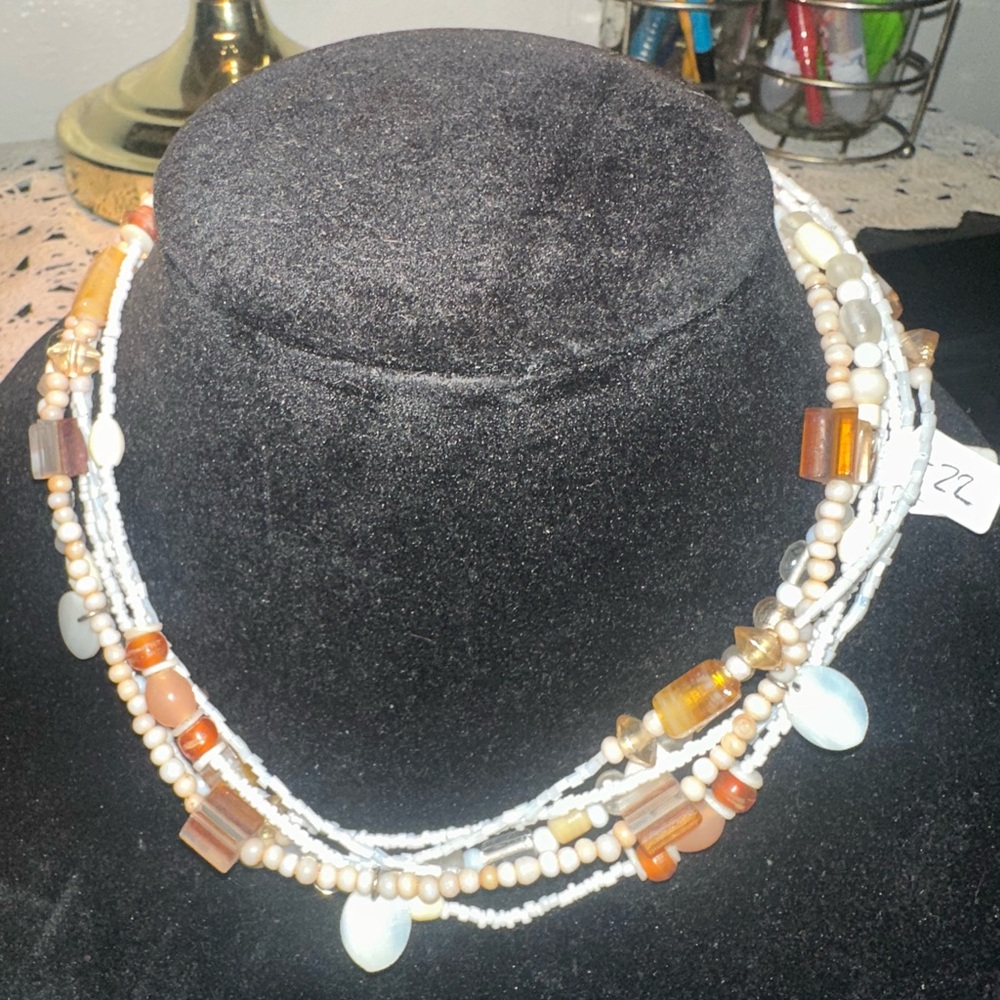 Brown and White Multi-Strand Necklace with Beads and Pendants